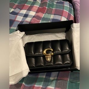 Studio shoulder bag with quilting